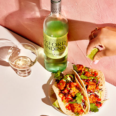 These bright and colourful Tacos, filled with all the usuals - lettuce, jalapenos, tomato, corn, black beans and chipotle sauce, are the perfect summerparty food and a great reason to enjoy a wine with friends - in this case,a refreshing Oxford Landing Sauvignon Blanc. Although… who needs a reason!