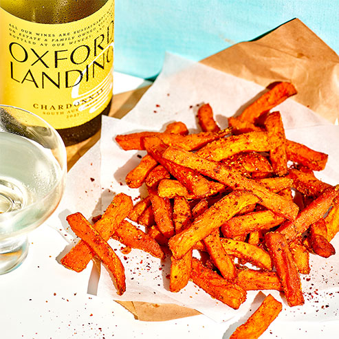 Baking your own super crisp sweet potato chips at home is not as challenging as you may think. Goes perfectly with a chilled Oxford Landing Chardonnay.
