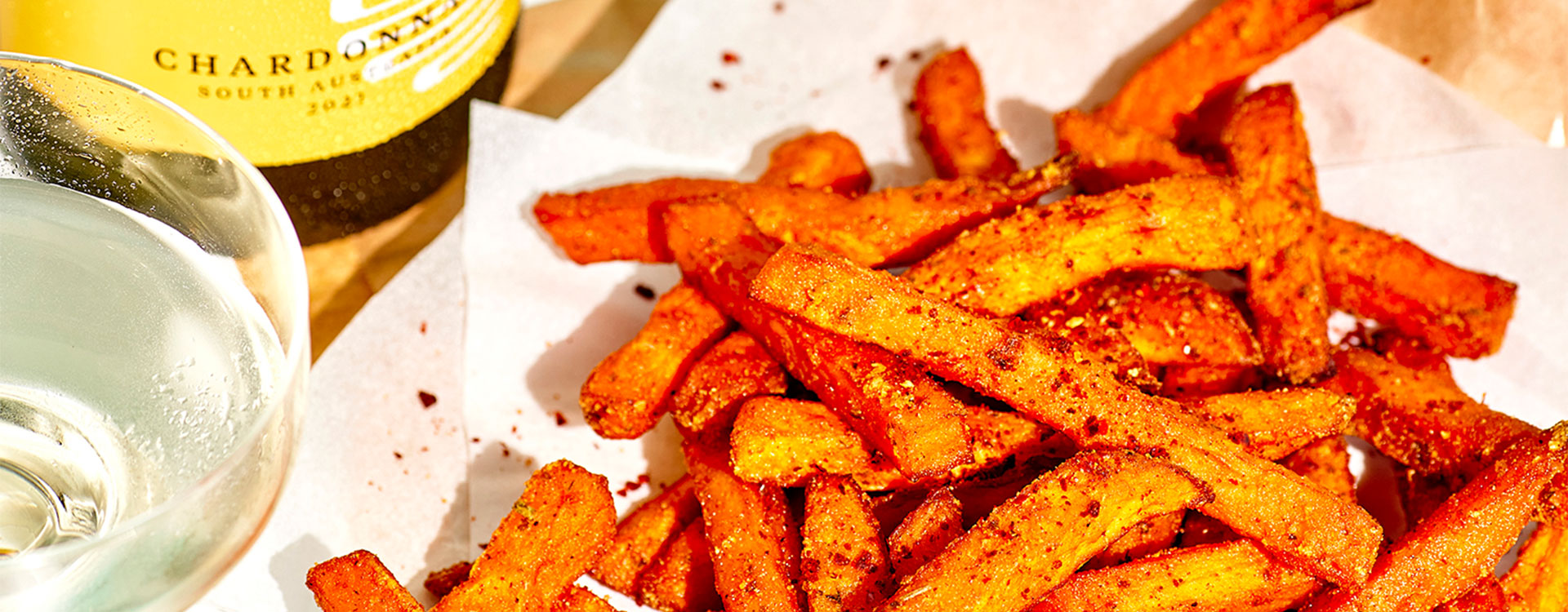 Baking your own super crisp sweet potato chips at home is not as challenging as you may think. Goes perfectly with a chilled Oxford Landing Chardonnay.
