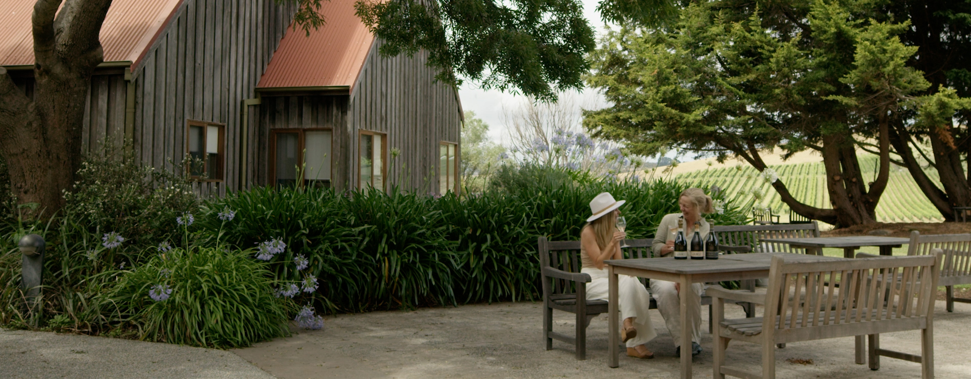 Jansz Winemaker Jennifer Doyle chatting with Left off the Map host Holly Bowden in front of the Jansz Tasmania Wine Room